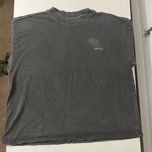 This is a light wash black tee from O’Neill. This shirt is a women’s size M.